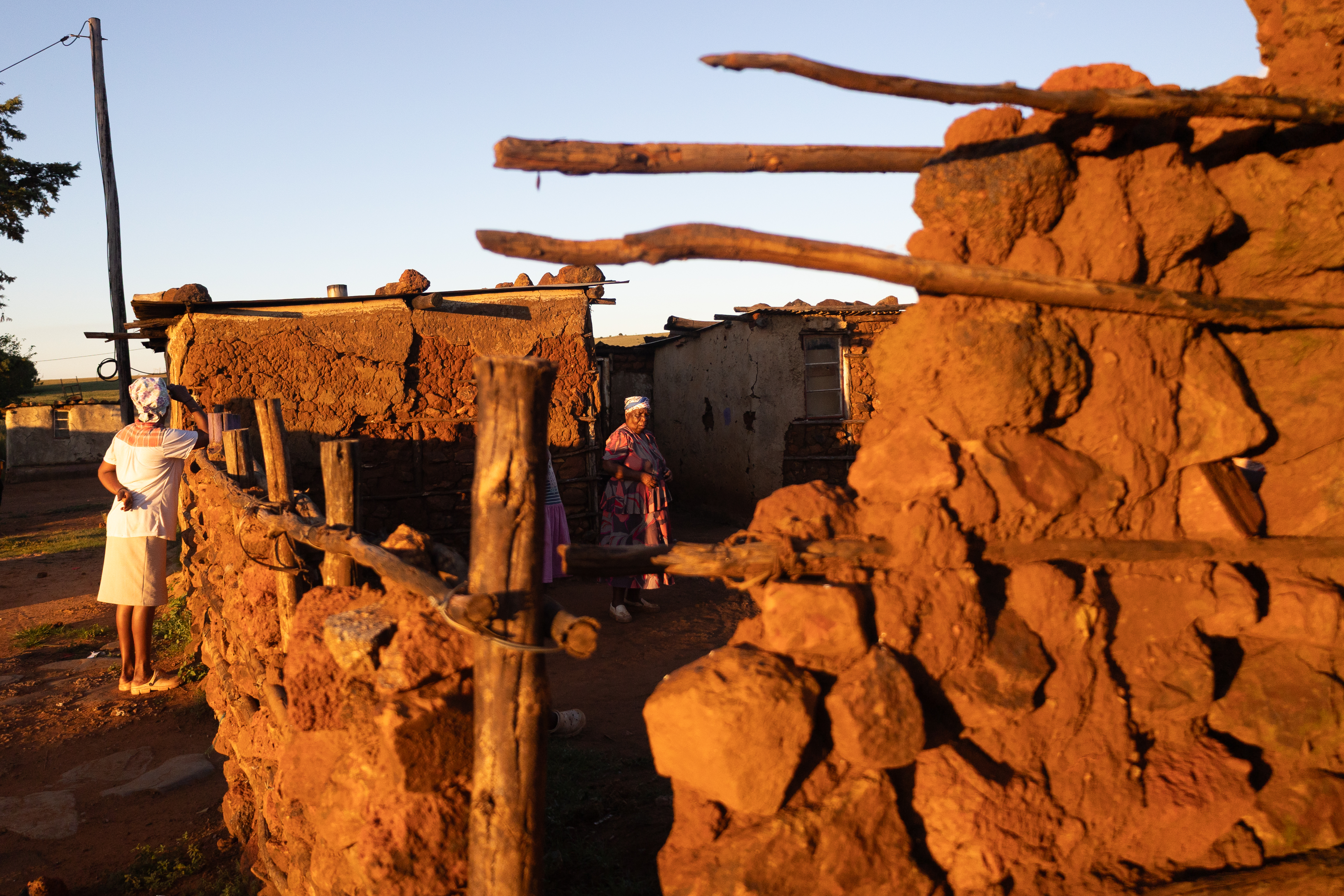 Martha Mvuleni (left) who is completely blind is photographed through a broken wall, Belkop Farm, near Mashishing, formerly known as Lydenburg, Mpumalanga. Mvuleni’s two granddaughters, Princess and Angel Mashego are attending school at the Bosele School for the Blind and Deaf, in Monsterlus, Limpopo. Picture: Alaister Russell